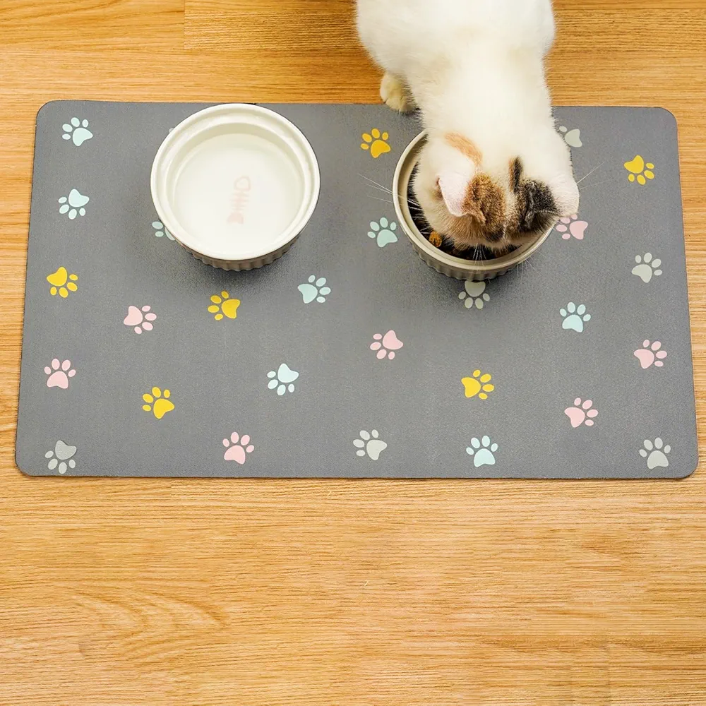 Solday Alfombrilla de comida para mascotas para perros y gatos, 50 x 30 cm, alfombrilla de silicona impermeable y antideslizante (gris claro)